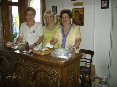 Αt the Holy Church of Agios Panteleimon in Votsi, the ladies of the Philoptochos during the feast of the Holy Church.