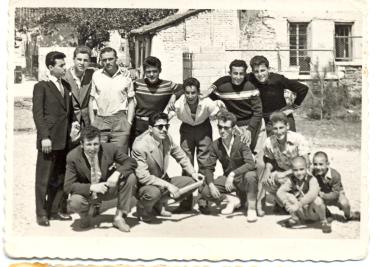 Young people of the Votsi settlement, in front of the club's clubhouse