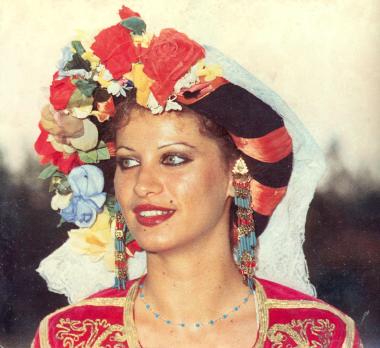 Lili Desyla, the traditional dance teacher of the club for four years (1980-84), wearing a uniform of the Lyceum of Hellenic Women.