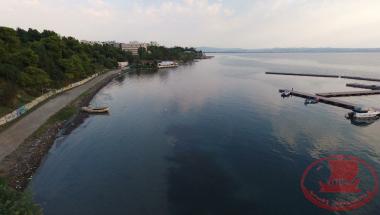 The coastal road of Aretsou with the pine trees up to Hamodrakas and Nea Krini. And the floating pavilions.