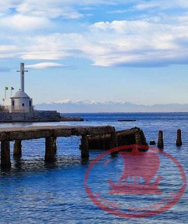 The Concrete harbor pier in Karabournaki