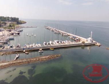 Karabournaki, the Port and the Church