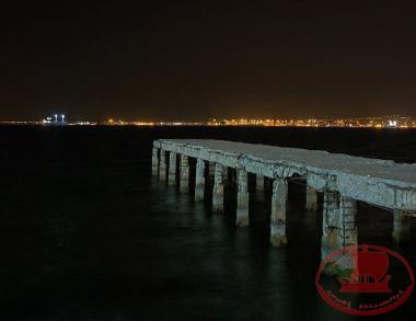 The Concrete harbor pier in Karabournaki
