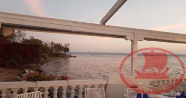 The Terrace of the Hamodraka Fish Tavern before the recreation of the beach of Nea Krini