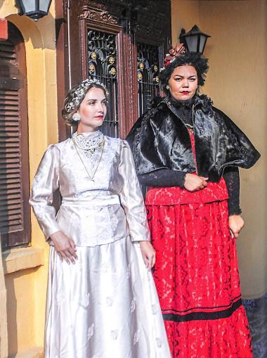 Traditional urban costumes, from left, of Smyrna and Constantinople