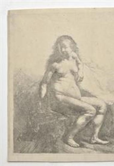 Γυμνή γυναίκα καθισμένη πάνω σε λόφο