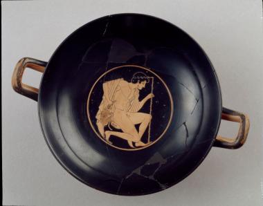 Πήλινο αγγείο. Ερυθρόμορφη κύλικα. Νέος με λαγό