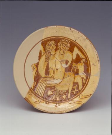 Πήλινο πινάκιο με παράσταση ζεύγους