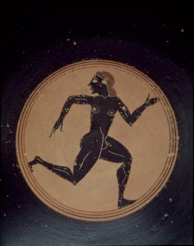 Αγγείο του ζ. Της Αθηνάς 533. Εσωτερικό μετάλλιο κύλικας με μελανόμορφη παράσταση δρομέα.