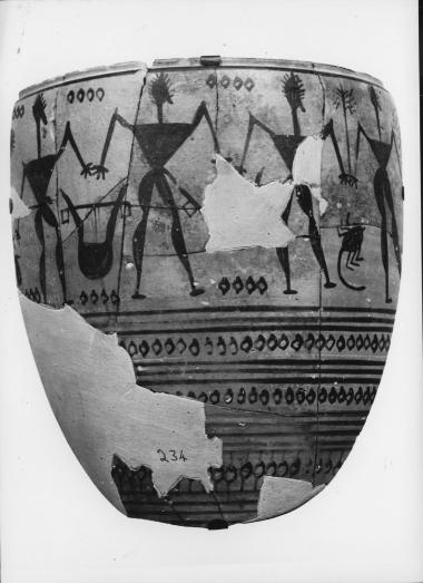 Θραύσμα από λακωνική γεωμετρική πυξίδα με χορό ανδρών.