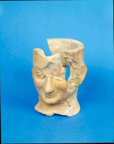 Πήλινη πρωτολημνιακή ανδρική κεφαλή (αγγείο;)