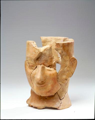 Πήλινη πρωτολημνιακή ανδρική κεφαλή (αγγείο;)