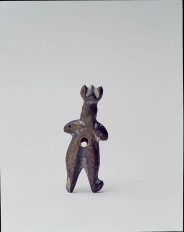 Λίθινο περίαπτο.