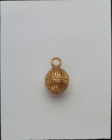 Χρυσό κουμπί.