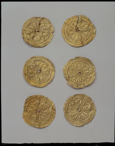 Έξι χρυσά δισκάρια