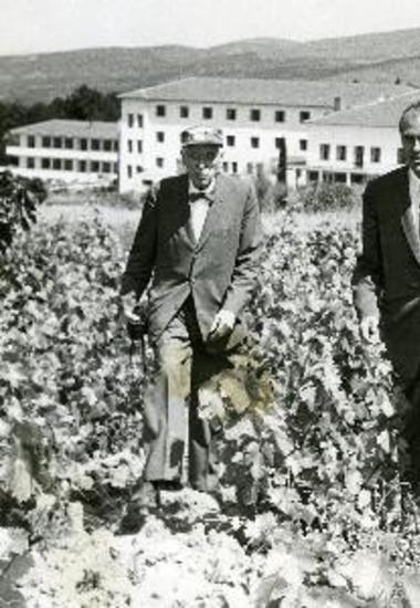 President Howard Johnston walking up a hill