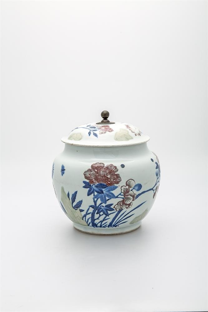 Lidded jar with relief and painted decoration with cobalt blue, copper red and celadon glaze