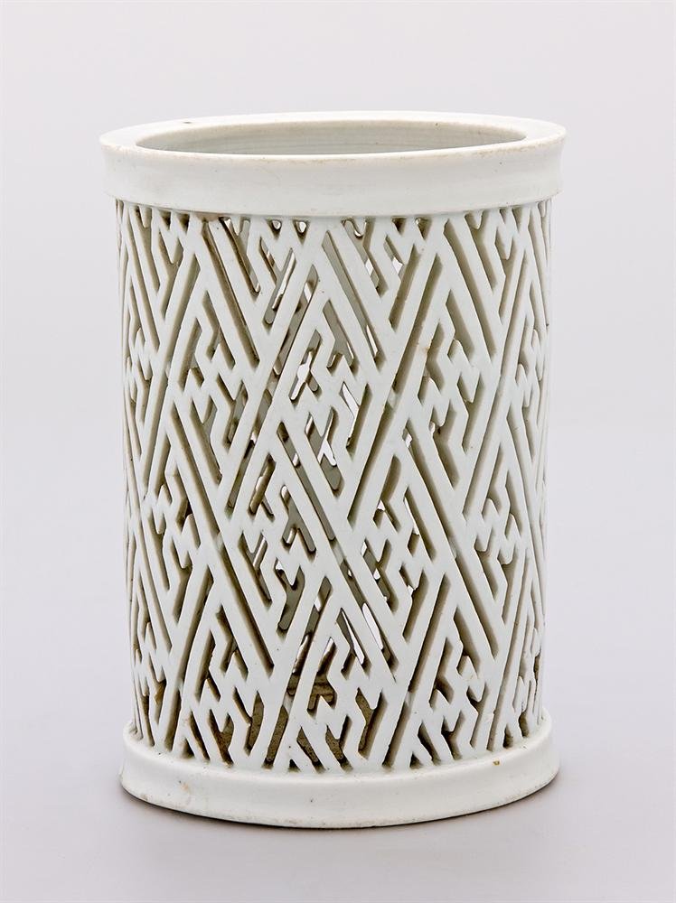 Brushpot from Dehua county, of  'blanc de Chine' porcelain with cut-out decoration