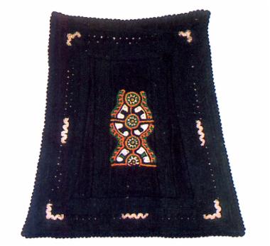 Παναούλα, σαρακατσάνικη μάλλινη τραπεζιόσχημη ποδιά αρραβωνιασμένης