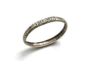 Chased silver bangle.
