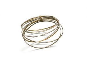 Seven bangles linked with clasp.