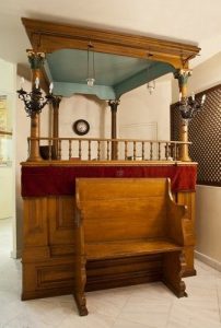 Elevated reader's platform of the Patras Synagogue.