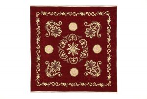 Wrapper, dark red velvet with gold embroidery, central floral ornament, corner motifs and scrolling floral border, motif of Star and Crescent in starburst.