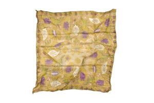 Yellow, beige and puple patterned silk, found in dowry chest.