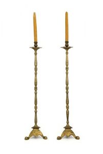 Brass candle holders , dedicated in memory of Solomon A. Cohen.