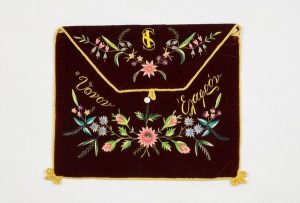 Velvet case for nightgown with floral embroidery and initials 'S