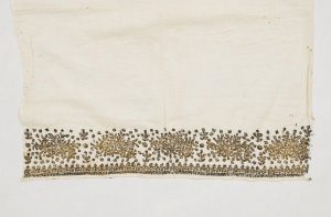 White cotton with silver metal thread embroidery, from Larissa.