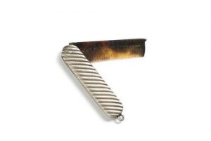Man's comb with metal handle
