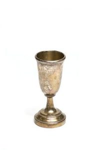 Silver cup with short stem.