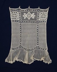 White cotton tulle with lace, belonged to Esther Modiano.
