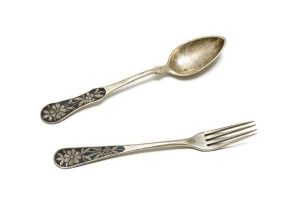 Silver cake fork and spoon with floral decoration in niello, initials 