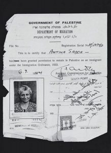 Certification by the Government of Palestine, granting permission to Antina Sadok to remain in Palestine as an immigrant under the Immigration Ordinance, 1933.