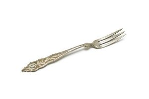 Silver cake fork with floral engraving and initials 