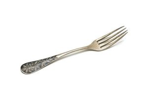 Silver cake fork with floral decoration in niello.