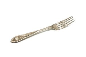 Silver cake fork, with initials 