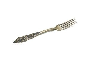 Silver cake fork with floral decoration in niello.