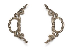 Pair of decorative massif metal handles, probably from rim of vessel.