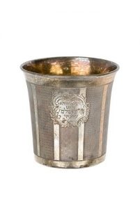 Silver cup with inscription.