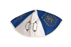 Scullcap, dark blue and white polyester satin with printed silver Jewish motifs of Star of David, Torah scroll, Lion of Juda and Western Wall, Jerusalem.