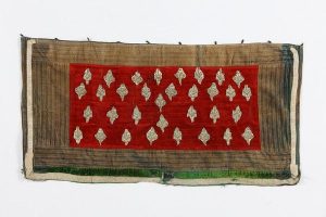 Tik (Torah case) wrapper, red cotton velvet centrepiece with sewn-on cutouts of light mint silk with gold embroidery (in secondary use), faded velvet border.