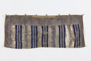 Tik (Torah case) wrapper, grey-blue irregular striped silk, broad border of faded embroidered cotton, probably made of garment sections.