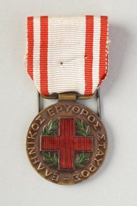 Medal of the Greek Red Cross awarded to Elly Sakki for her medical services, as a nurse, during the 1940-41 war.