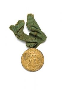Medal with green ribbon, from Dance Academy G. Anagnostou.