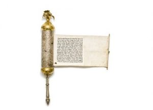 Esther scroll with partly gilt silver repousse case.