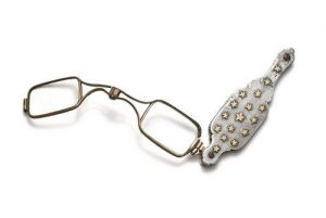 Opera glasses, metal and silver. The handle is decorated with little stars.