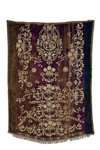 Torah ark curtain, faded purple velvet with gold embroidery, made from festive dress in Ottoman style, dedicated by Hannah, wife of Abraham M